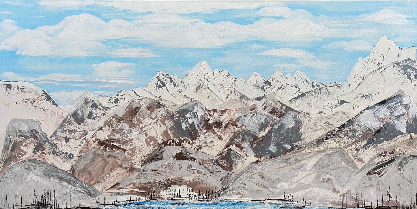 A canvas painting featuring a mountainous landscape under a bright blue sky.
