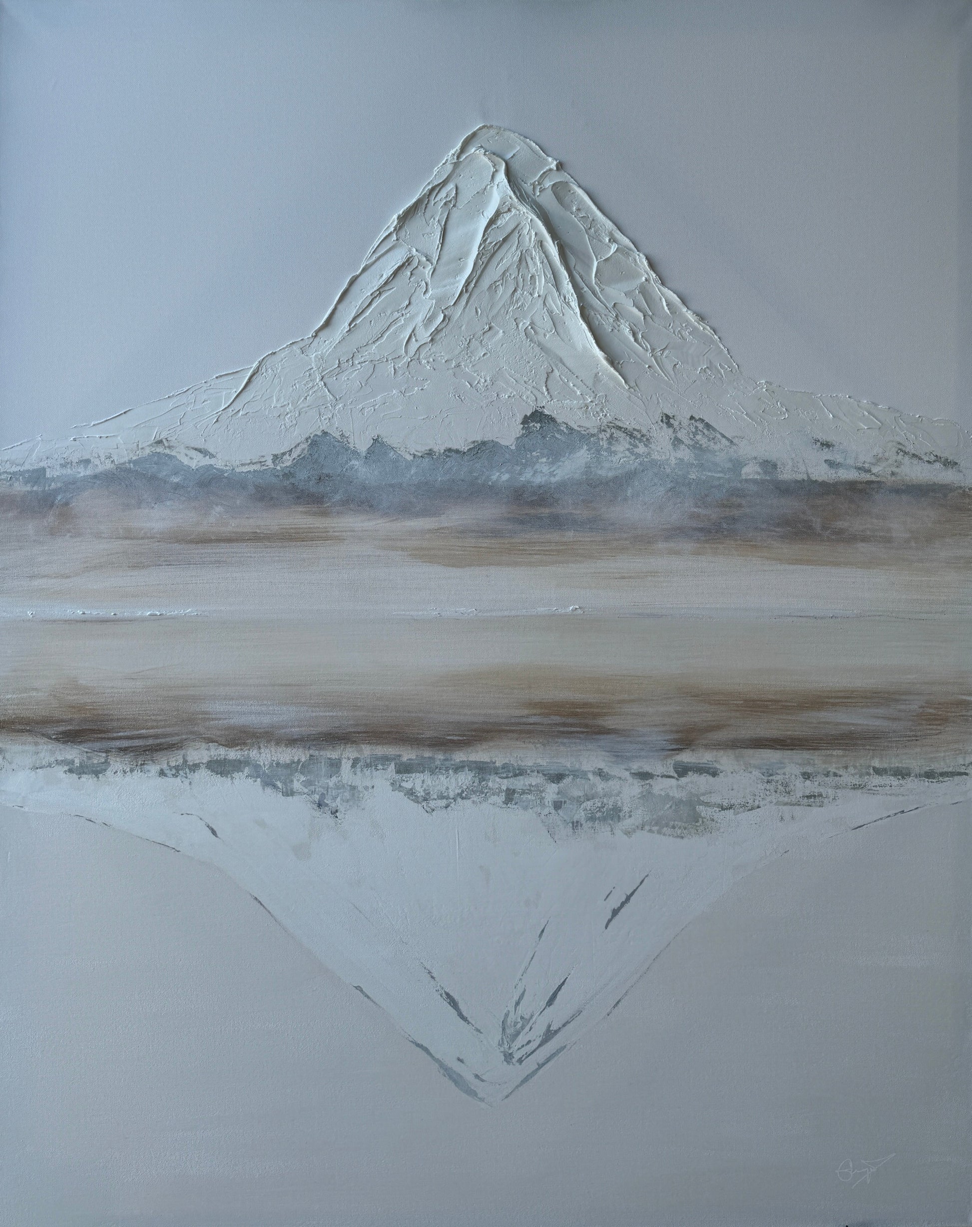 A canvas artwork featuring a stylized representation of a mountain with a triangular peak, surrounded by a gradient of gray to white colors, with a misty background.