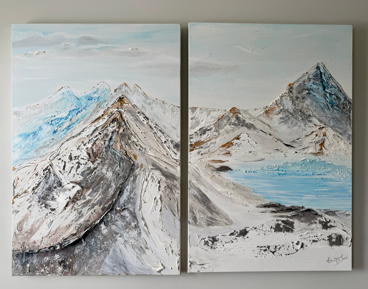 Two canvases in a joint painting (diptych) of a texturized rocky mountain landscape.