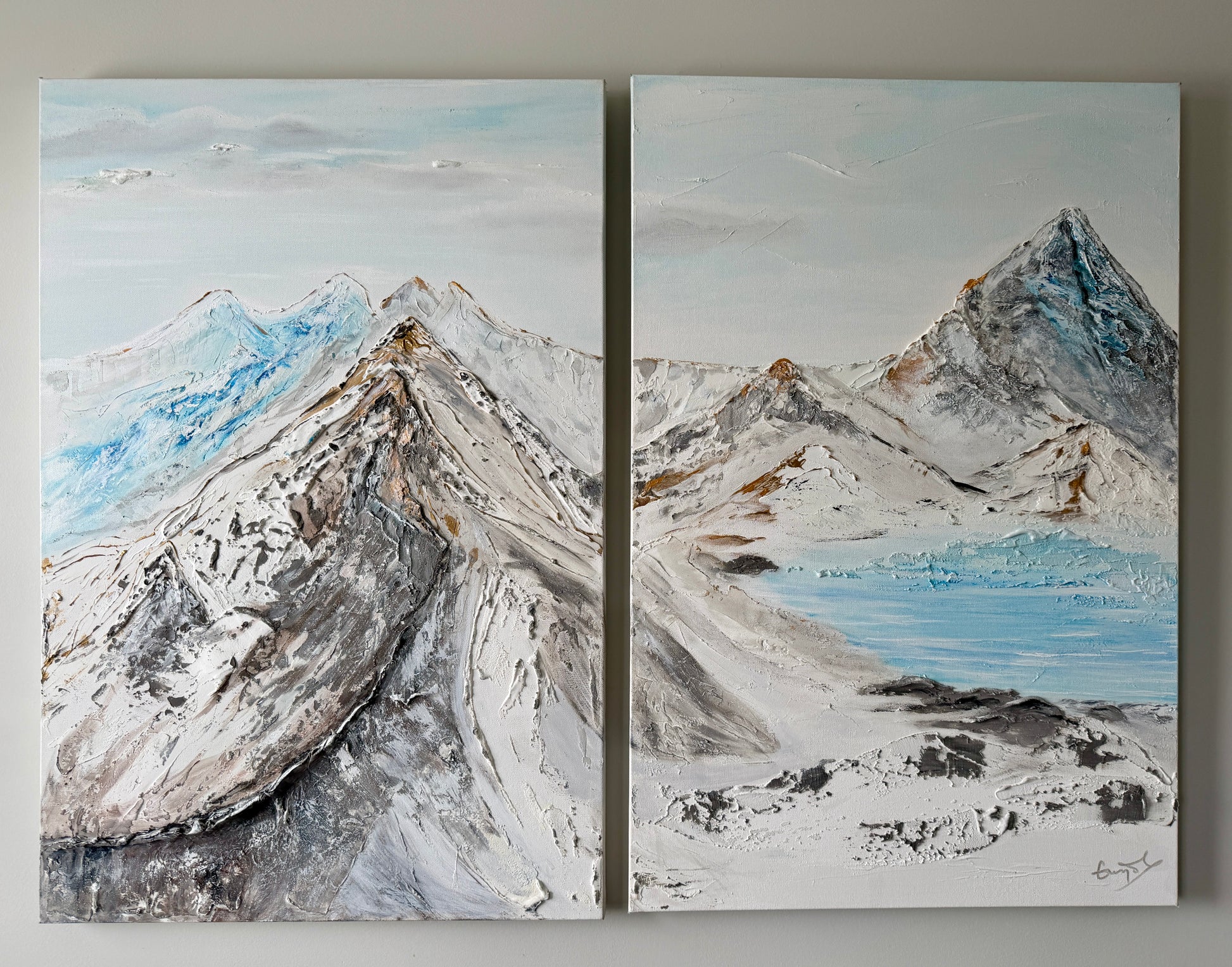 Two canvases in a joint painting (diptych) of a texturized rocky mountain landscape.