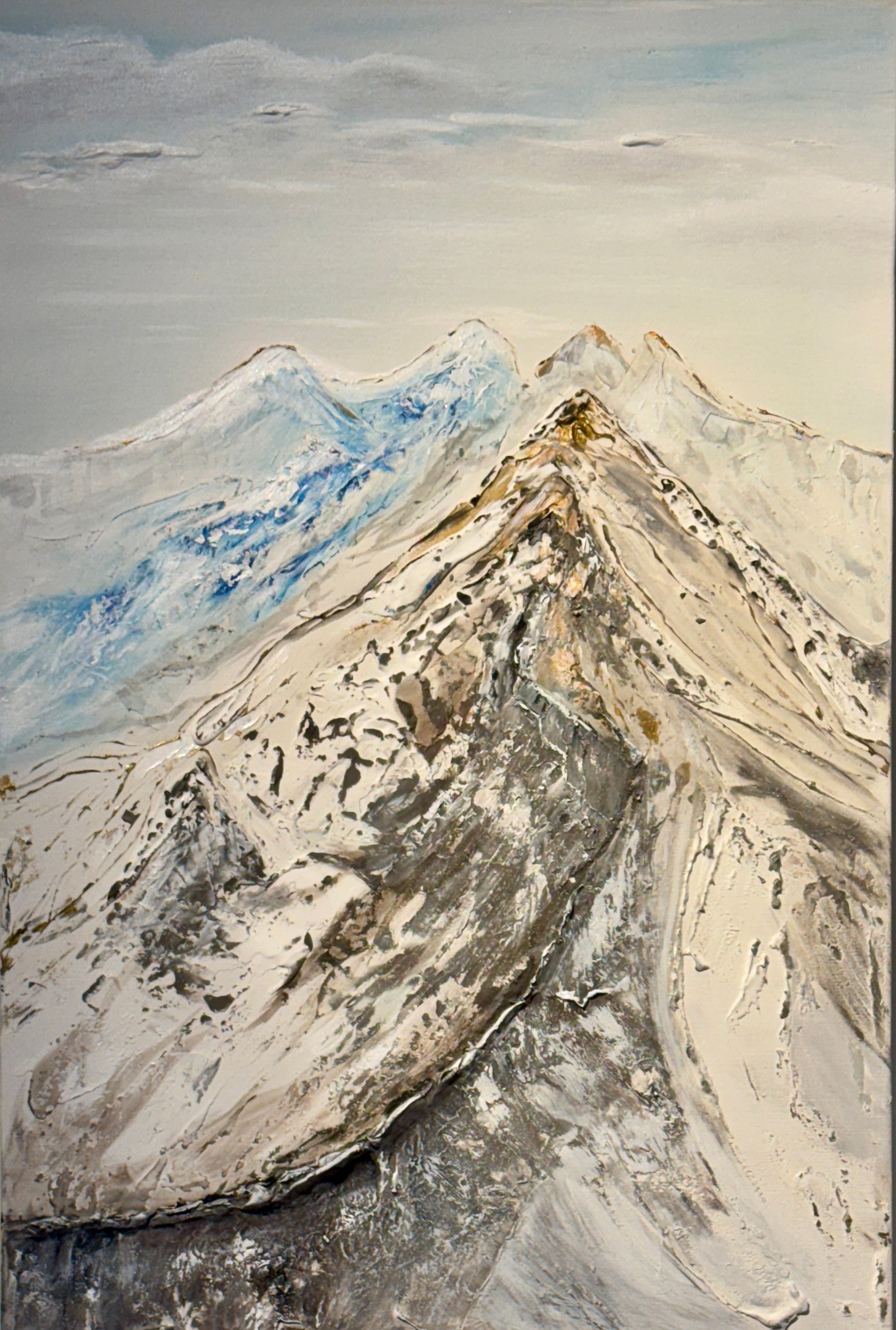 Highly textured rocky mountain landscape painting of a ridge going up the mountain