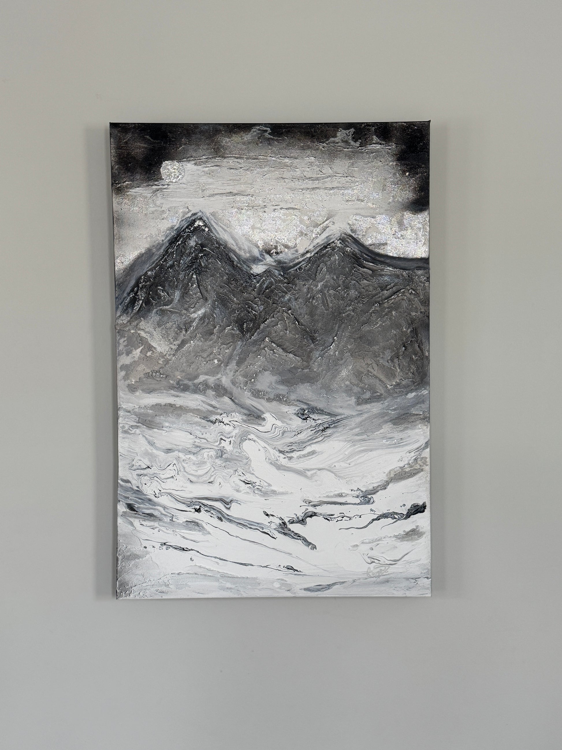 Large painting with highly texturized mountains under a silver night sky