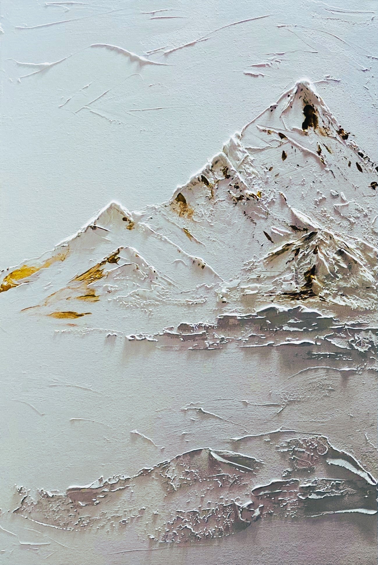 Heavily texturized paintings of rocky mountain range with snowy sun kissed peaks. 